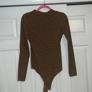 Fendi x Skims bodysuit. Mock neck long sleeve bodysuit. Size large. Worn once.
